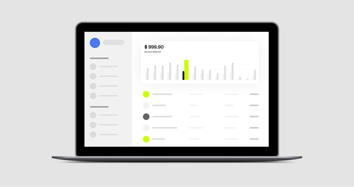 A laptop displays a financial dashboard with a sidebar menu, a bar graph showing account activity, and an account balance of $989.90 highlighted at the top. Some elements are accented in green and black.